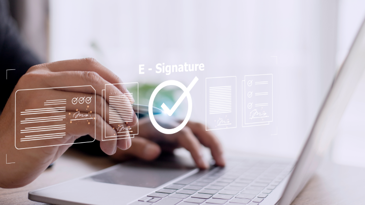 graphic of an electronic signature on a laptop